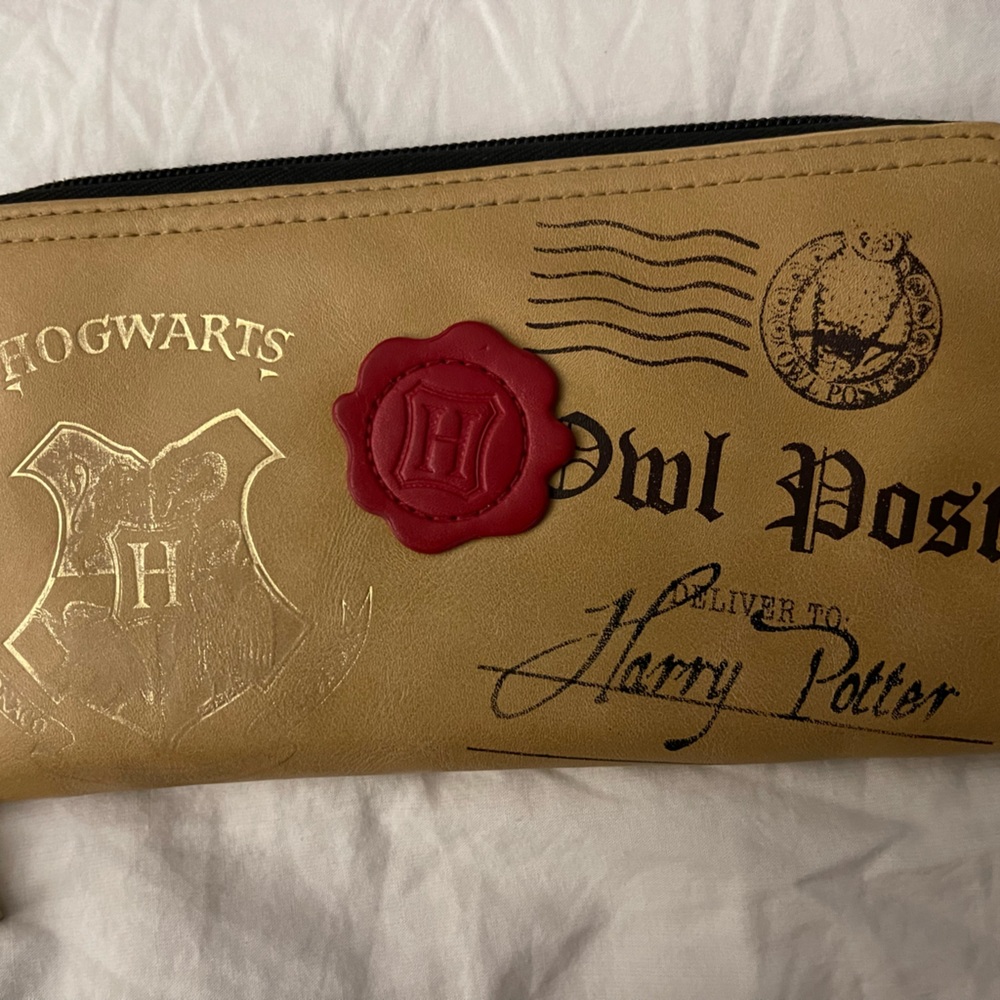 Gently used Harry Potter wallet.